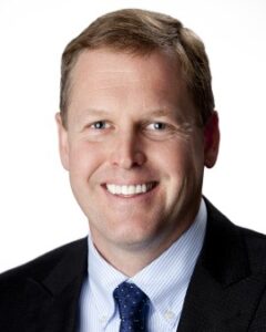 Smiling Middle Aged White Male in Suit and Tie